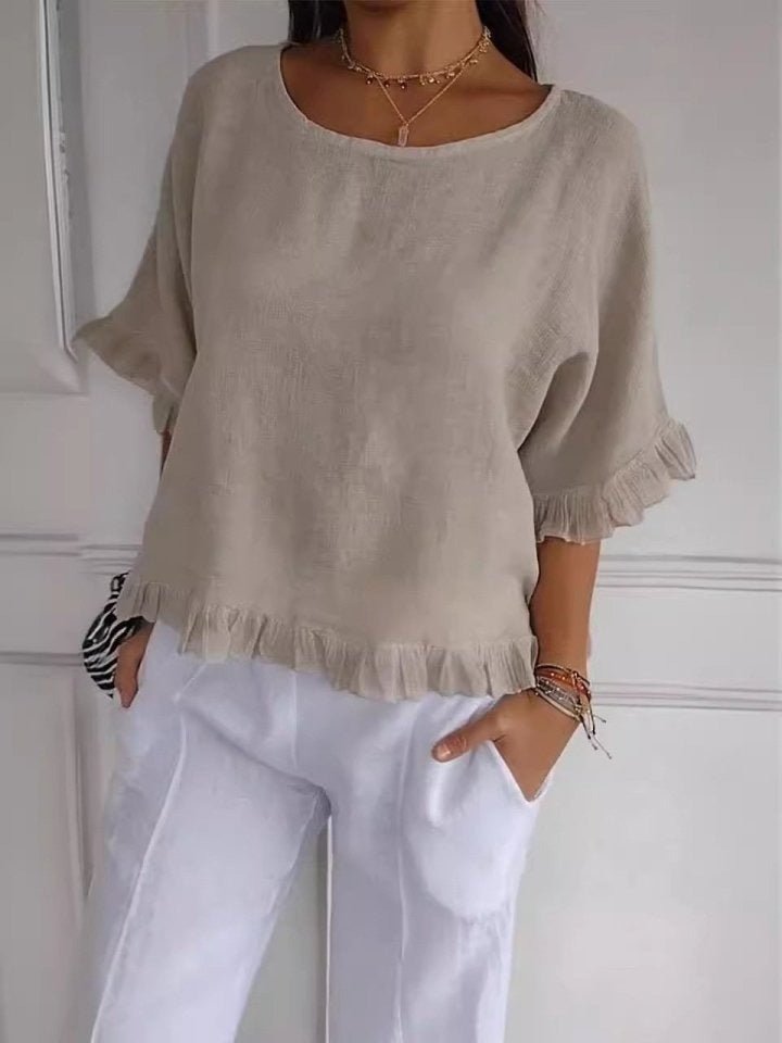 Blusa casual de manga corta con delicados vuelos