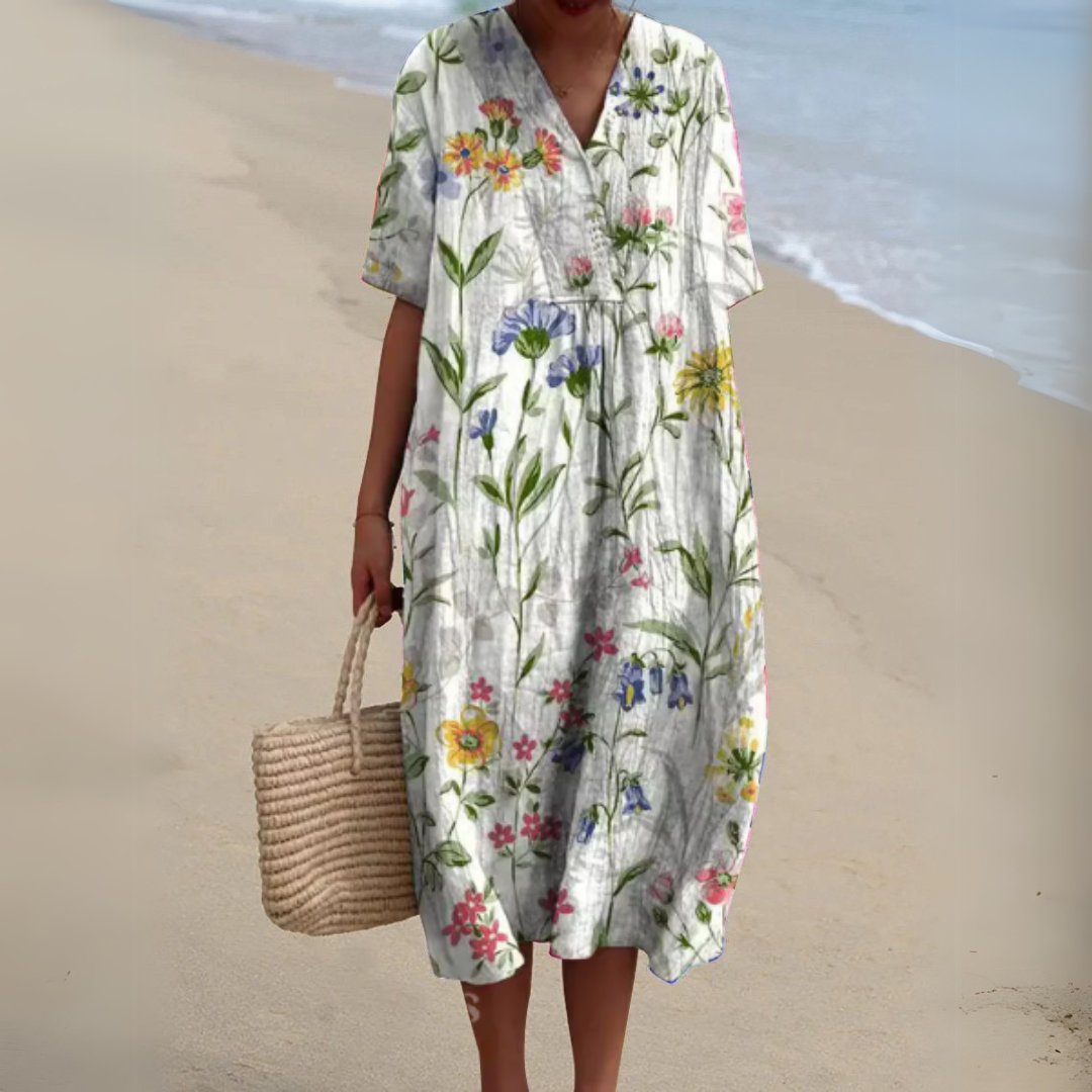 Vestido midi con diseño floral de mangas cortas y escote en V