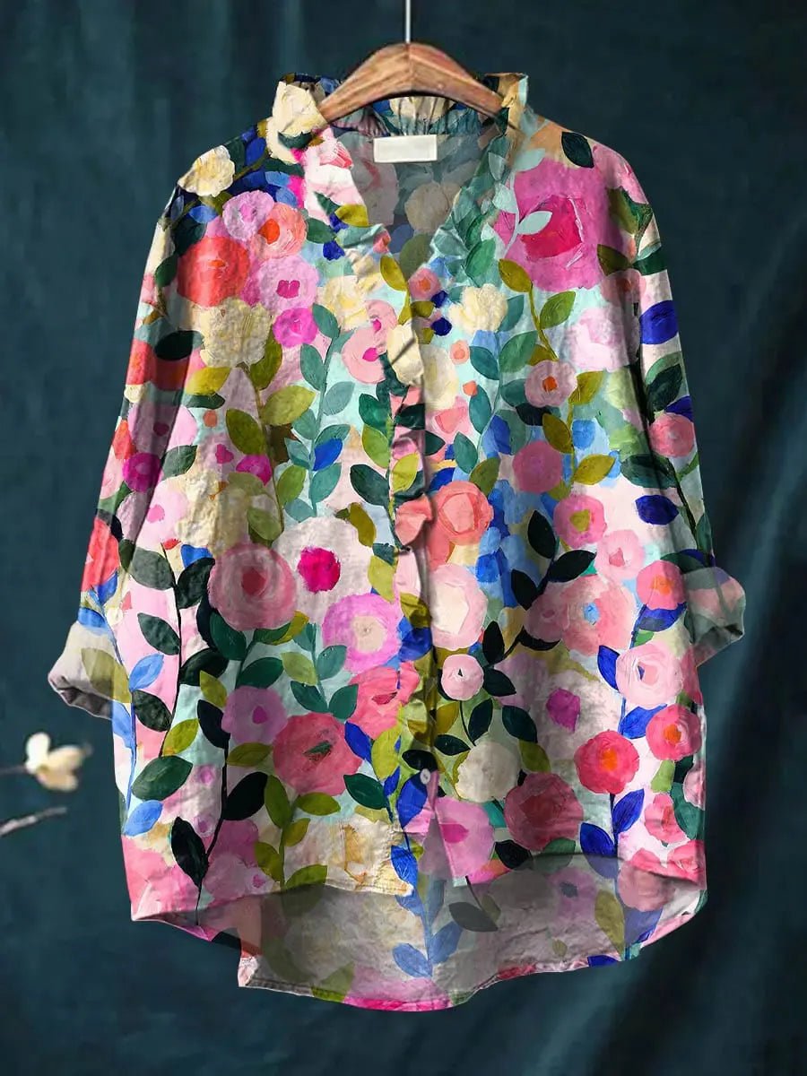 Blusa fluida de lino y algodón con estampado floral y escote con volantes