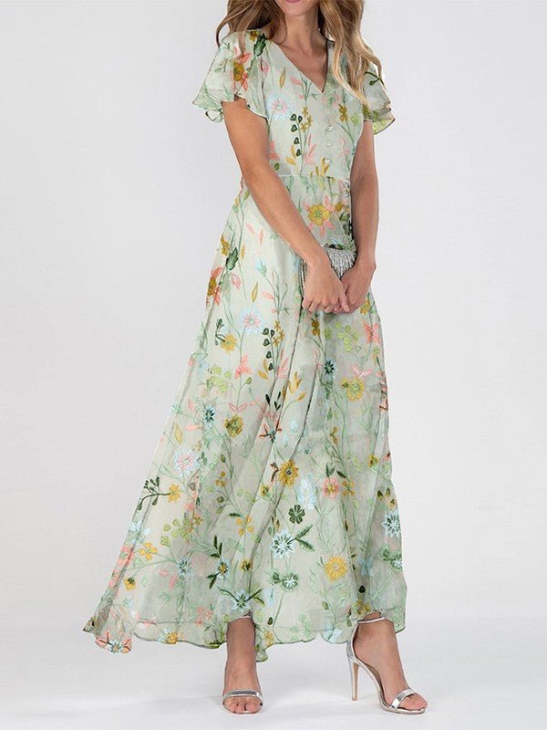 Vestido largo fluido con estampado floral y cuello en V