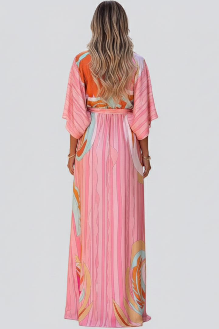 Vestido largo estampado con cuello en V y cinto ajustable
