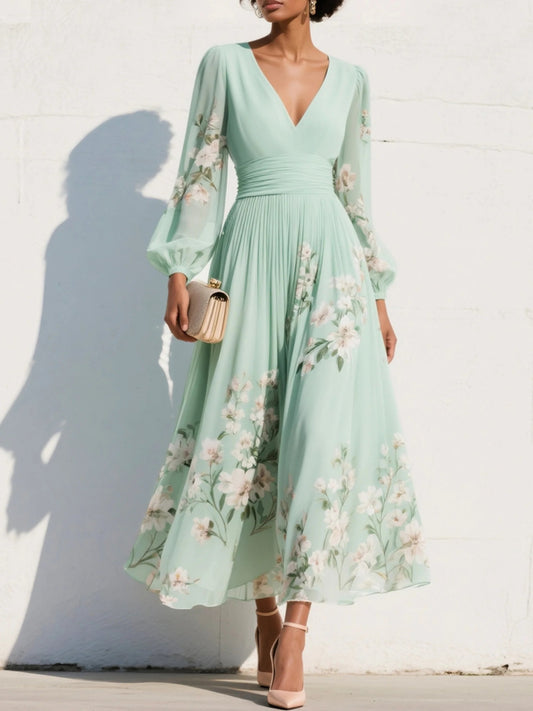 Vestido midi con escote en V, cintura tableada y mangas abullonadas de flores