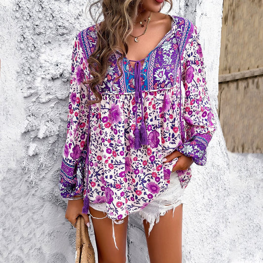 Blusa túnica holgada con escote en V, lazo con borlas y diseño floral para mujer