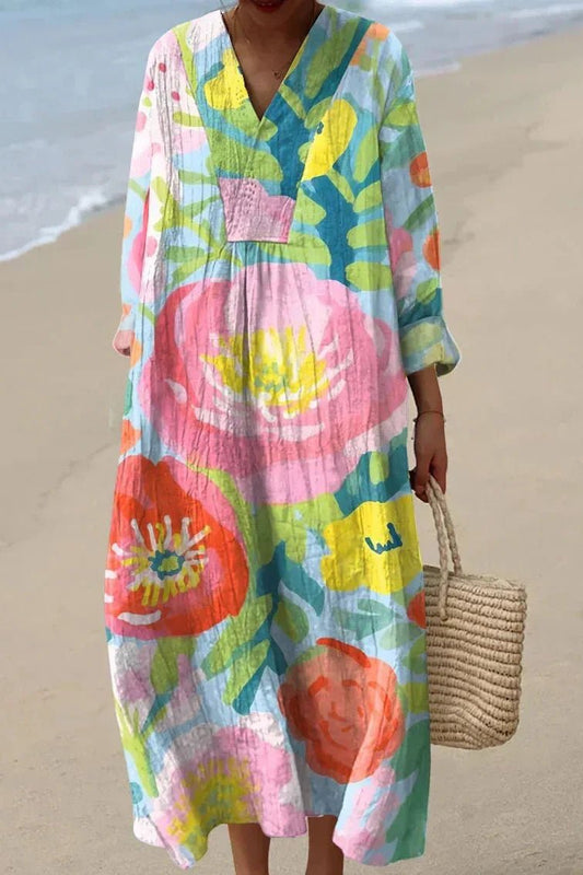 Maxivestido holgado de lino con diseño floral y escote en V