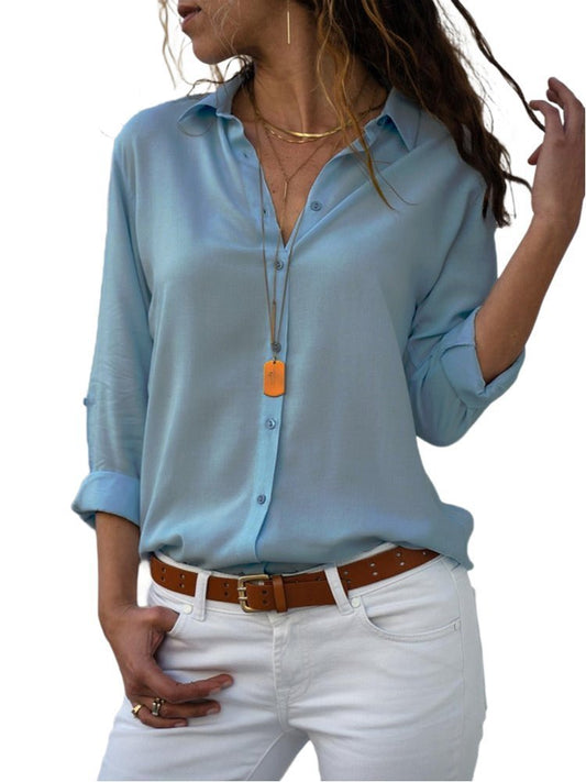Blusa camisera ligera con botones frontales y mangas ajustables para mujer
