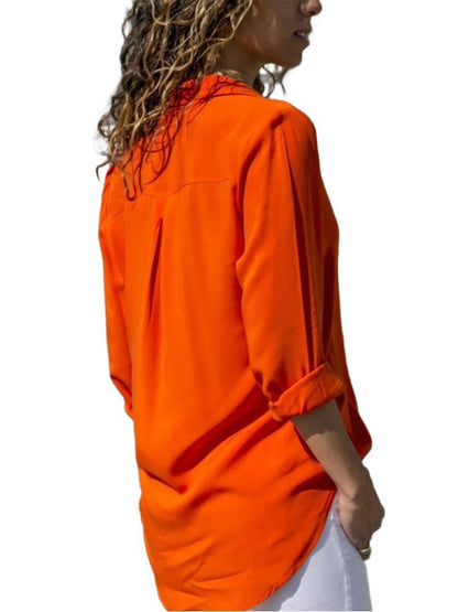 Blusa camisera ligera con botones frontales y mangas ajustables para mujer