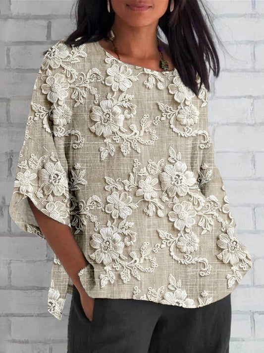 Blusa romántica holgada con bordados florales y detalles de encaje