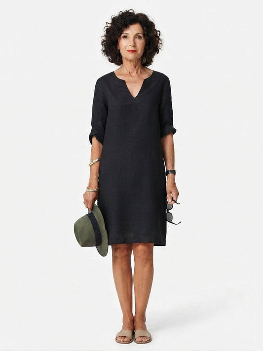 Vestido midi femenino de corte fluido con cuello estilizado